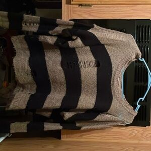 Black and light brown striped sweater